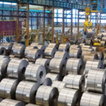 A row of aluminum stored in a warehouse